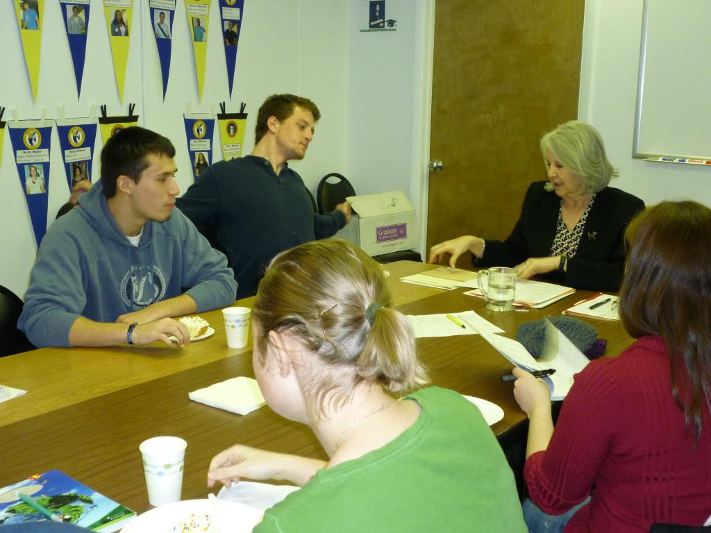 Dr. Patricia Wallace, Director of the McNair Scholars Program, works with program participants at SHU. 