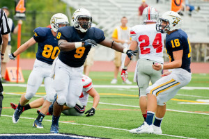 Donavon Campbell (#9) tied his own school record of eight catches, and broke his record of receiving yards with 111 at the Saints season opener against Grand View. (Photo Laura Marsh)