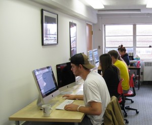 The Intro to News Reporting Students take advantage of the labs Mac computers with  the Adobe Editing Suite. (Photo Spectra Staff)